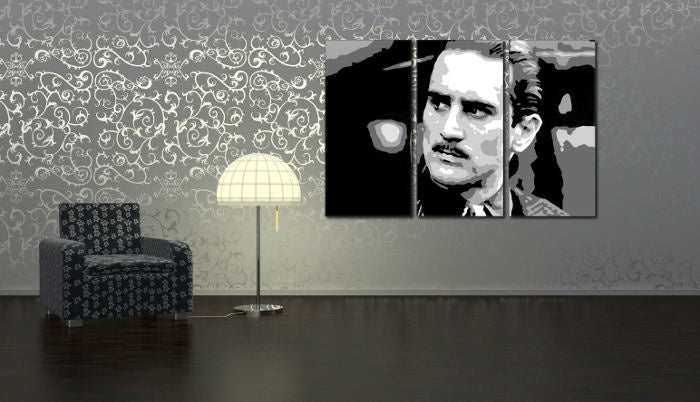 Pop art slika na platnu s motivom Godfather Rober De Niro u belo-sivih nijansama okačena u enterijeru radne sobe, intenzivna atmosfera, filmski svet i gradski život – enterijer