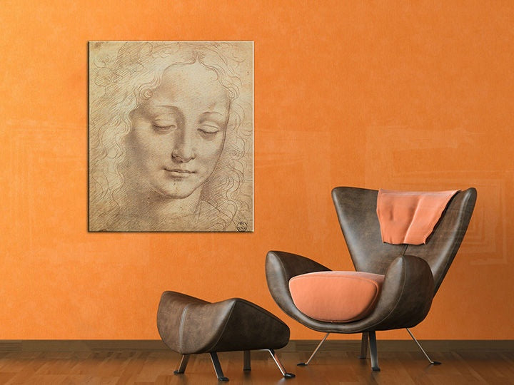 Vintage slika na platnu s motivom HLAVA ŽENE 3 – Leonardo Da Vinci, pejzaž, priroda u narandžastih nijansama okačena u enterijeru radne sobe, duhovnost i lepota – enterijer